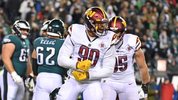 Washington Commanders defensive end Montez Sweat (90) celebrates after a sack against the Philadelphia Eagles during the fourth quarter at Lincoln Financial Field.